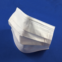 Load image into Gallery viewer, White Self Adhesive SAM brand mask on a blue background